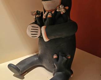 8. Seated Black Bear Storyteller with five cubs. Junaita Inez Ortiz (Mapuwana-Wild Rose). Cochiti Pueblo. 7.5" high x 5" width. (Item ref: 16/925)