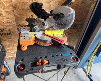 Chop saw on portable stand
