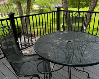Black rod iron table with 2 chairs