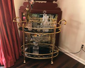 Decanters, mirror, metal bar cart
