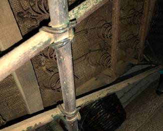 Antique black wicker sofa underside