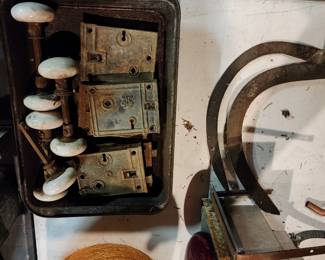 Antique door knobs and locks, sickles