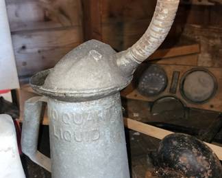 One of many metal cans with spouts