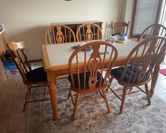 . . . nice oak table and chairs with tile inlay