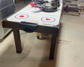 . . . air-hockey game -- pots/pans