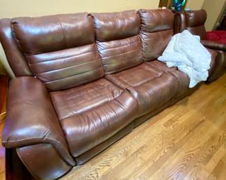 Power leather reclining sofa.  Both ends of sofa have power.