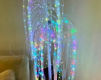 Lighted weeping birch trees