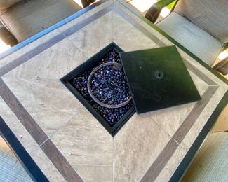 Outdoor table with center firepit