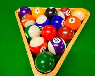 Pool balls and rack to be sold with pool table