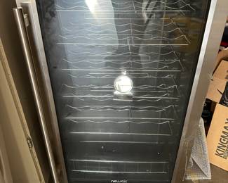 NEWAIR freestanding wine fridge.         33 bottles. Stainless steel.