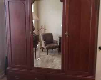 Wardrobe armoire w mirrored panel.