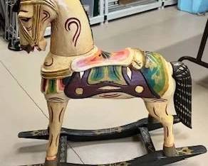 Hand painted and hand carved rocking horse, circa 1950's collectible. Not a toy, although it is large enough for a child to sit on. Up to you. 