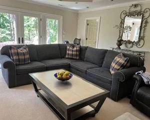 Custom made 82" sectional, braided trim, cushions included