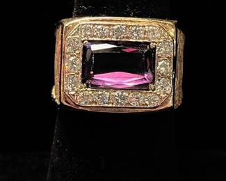 14 kt ring with synthetic sapphire and 1 carat in diamonds 2200.