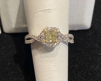 18 kt yellow diamond center and diamond accent