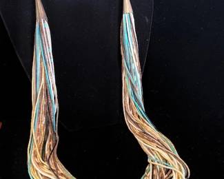 Necklace is 1200. now priced at 600.