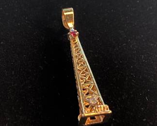 Oil derrick pendant with diamond and ruby. 14kt $1200.