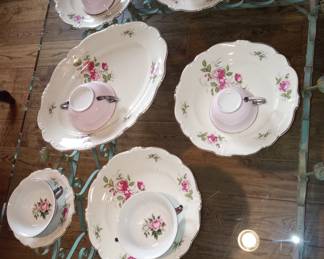 Two Different Sets of Finest German Porcelain Dinner Services, A Pink Set, and a US Zone "ROSENTHAL" Red Rose pattern set,