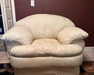 Cream Leather Chair, 45” w x 33.5" d x 32" h, $75
