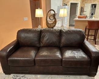 Leather Sofa, 81" w x 39" d x 36" h , $450. Complete 3-Piece Set, $985