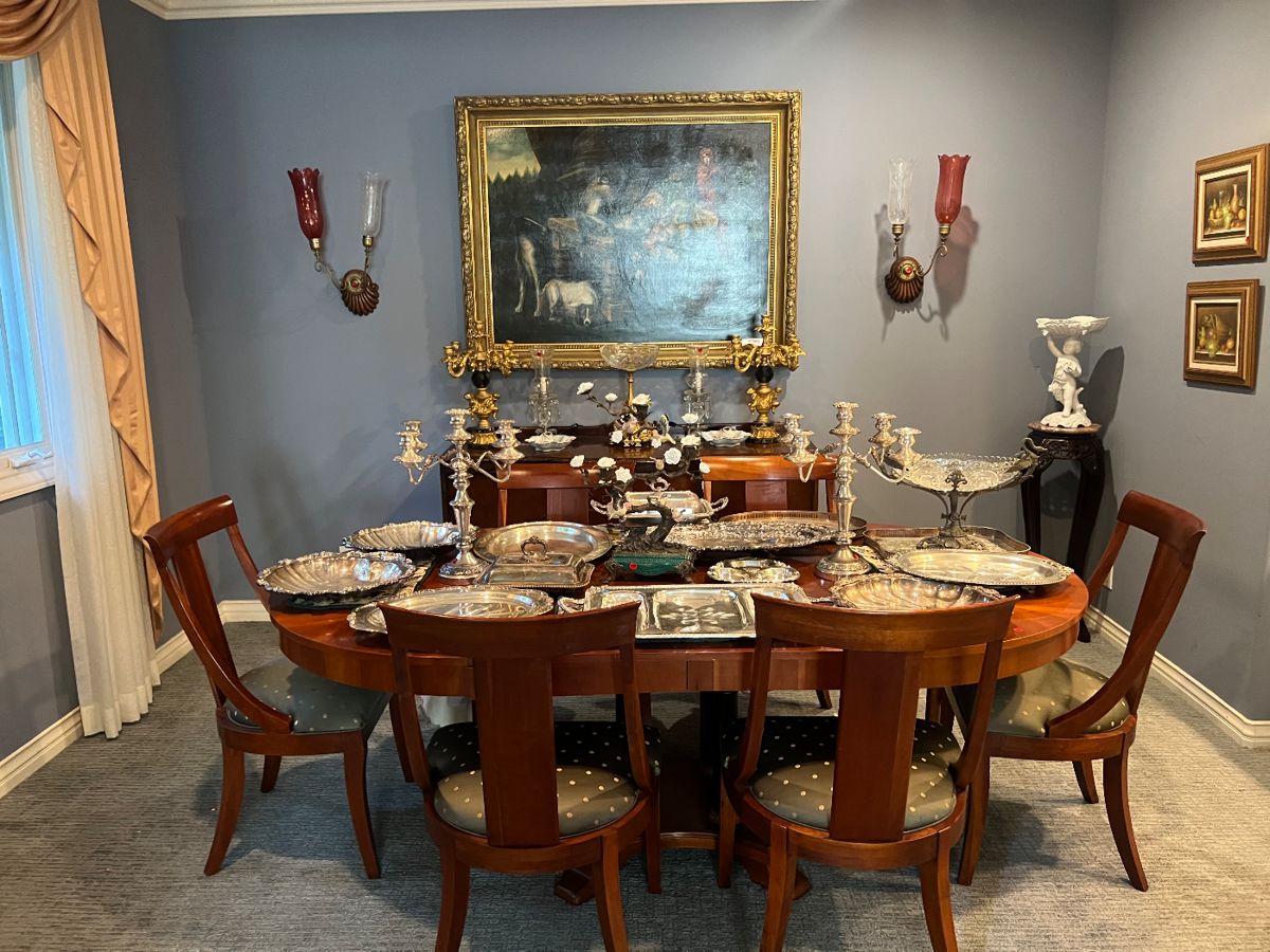 Dining table with 6 hairs $700
Painting is $700