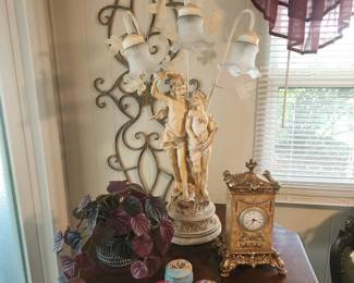 Octagonal accent table, figural lamp, metal sculpture