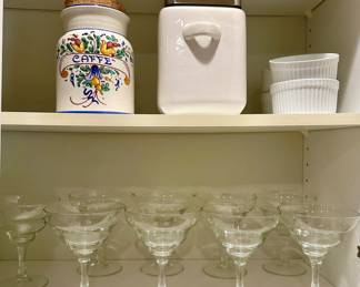 Both canisters on the top shelf are sold.