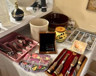 The fork and knife set on the right is sold.