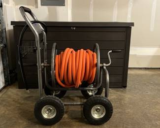 Garden hose and roller base 