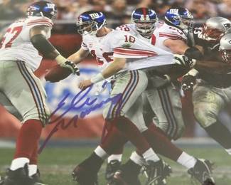 Signed Eli Manning framed photograph 