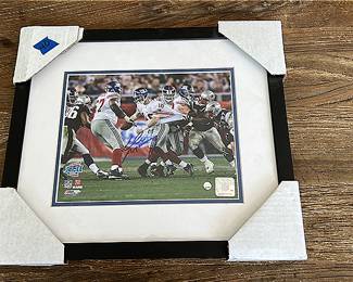 Signed Eli Manning framed photograph 
