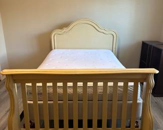 Converts to daybed or crib