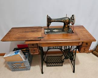 1911 singer sewing machine with cabinet