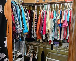 Full closet woman's fashion and shoes