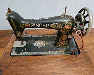 1911 singer swing machine with cabinet