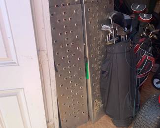 Great clean shed with extendable ladders, riding lawnmower attachments, golf club set, car ramps and more! 