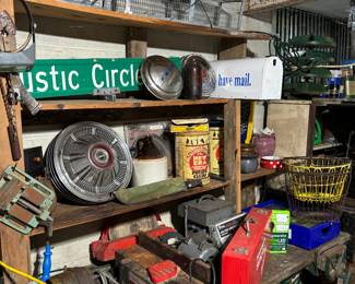 Vintage 1960's Ford Bronco hubcap set, Milwaukee tools, animal traps, vintage tins, shelves