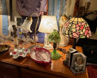 Stained glass and other antique lamps, book ends
