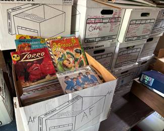 Dozens of boxes of vinyl records in original sleeves