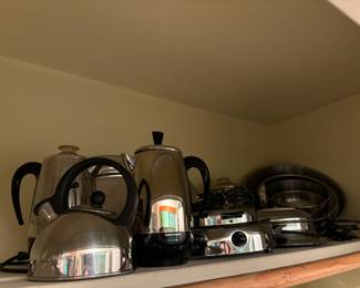 Vintage percolators, tea kettle, waffle irons, mixing bowls
