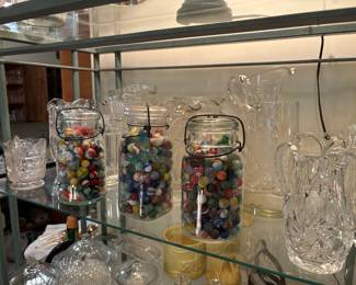 Antique marbles, pitchers, crystal
