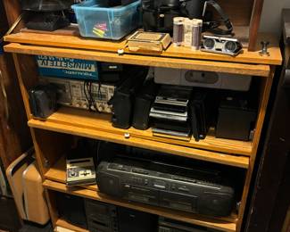 Book shelves, electronics, boom boxes, binoculars