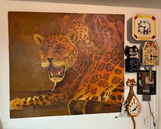 Fantastic mid century cheetah artwork, cat clocks, antique clocks, advertisement mirror