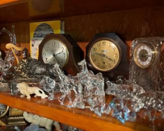 Crystal animals, antique clocks