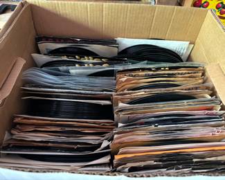 Dozens of boxes of vinyl records in original sleeves