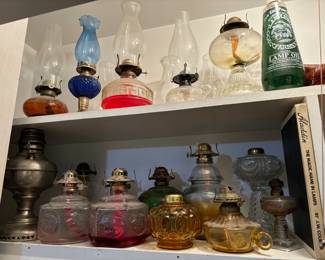 Oil lamps (globes on upper shelf)