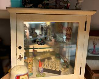 Antique display cabinet with original key, nesting doll