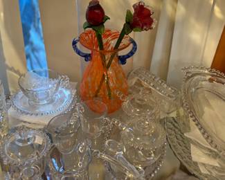 Art glass vase, shelves of candlewick