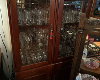 Two beautiful matching lighted display cases in like new condition