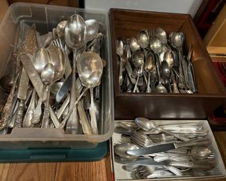 Piles of vintage flatware, U.S. Navy silverware
